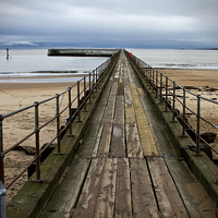 Buy canvas prints of Wooden Pier at Blyth Northumberland by Jim Jones