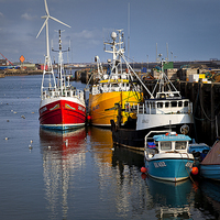 Buy canvas prints of Fishing boats in harbour by Jim Jones