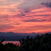 Buy canvas prints of Sunset on Lake Garda by Jim Jones