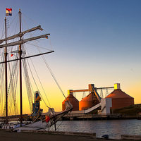 Buy canvas prints of  Sunset, sails and Silos by Jim Jones
