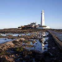 Buy canvas prints of Reflections of St Mary's Lighthouse by Jim Jones