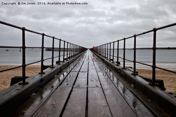 Wet wooden pier Picture Board by Jim Jones