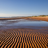 Buy canvas prints of Ripples under a blue sky by Jim Jones