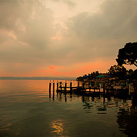 Buy canvas prints of  Sirmione Sunset by Jim Jones