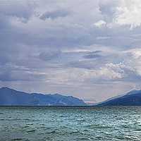 Buy canvas prints of Lake Garda morning panorama by Jim Jones