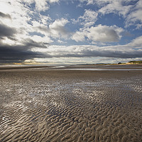 Buy canvas prints of Rain cloud leaving Druridge Bay in Northumberland by Jim Jones