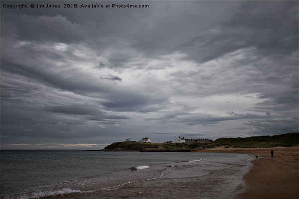 The beach at Seaton Sluice under stormy skies Picture Board by Jim Jones