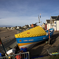 Buy canvas prints of Colourful fishing Coble by Jim Jones