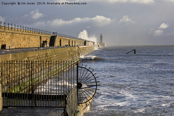 Waves crashing over Tynemouth Pier. Picture Board by Jim Jones