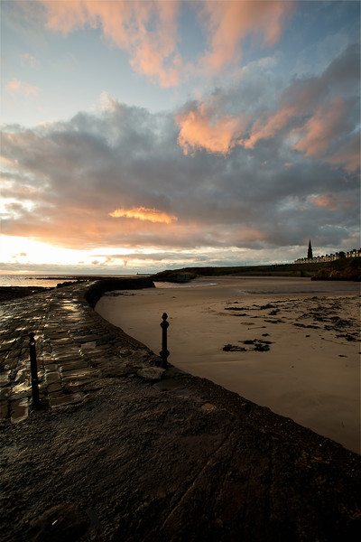 Cullercoats Bay sunrise. Picture Board by Jim Jones