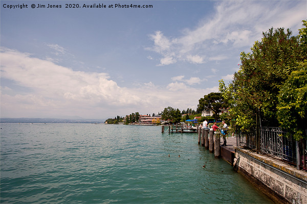 Sunny Lake Garda at Sirmione. Picture Board by Jim Jones