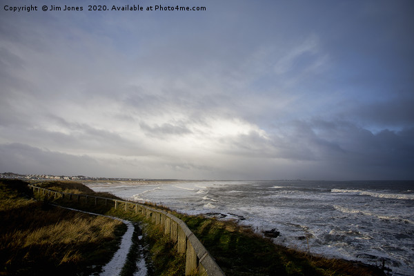 Winter sunshine at the coast Picture Board by Jim Jones