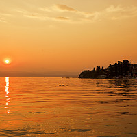 Buy canvas prints of Sirmione Sunset over Lake Garda by Jim Jones