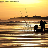 Buy canvas prints of Fishermen on the beach at sunrise by Jim Jones