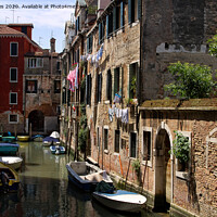 Buy canvas prints of Washing day in Venice by Jim Jones