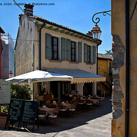 Buy canvas prints of Caffe Visconti, Borghetto sul Mincio by Jim Jones