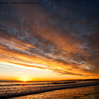 Buy canvas prints of Morning sun sitting on the horizon by Jim Jones