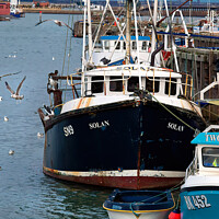 Buy canvas prints of  Fishing boats and seagulls by Jim Jones