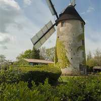 Buy canvas prints of Windmill and a bicycle by Ian Jones