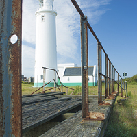 Buy canvas prints of Hurst Point Lighthouse by Ian Jones