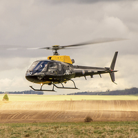 Buy canvas prints of Eurocopter AS350 training flight by Ian Jones