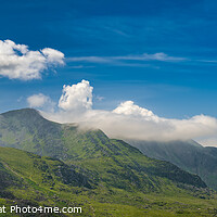 Buy canvas prints of Rescue Helicopter Tryfan Mountain Wales by Adrian Evans