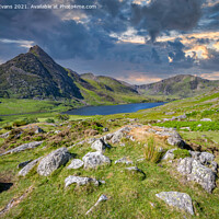 Buy canvas prints of Tryfan Mountain And Llyn Ogwen Wales by Adrian Evans