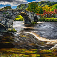 Buy canvas prints of Llanrwst Cottage And Bridge by Adrian Evans