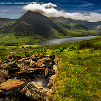 Buy canvas prints of Tryfan Mountain And Llyn Ogwen by Adrian Evans