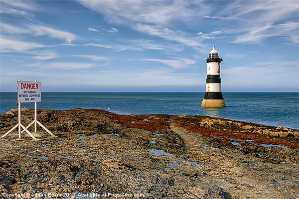 Penmon Point Lighthouse Picture Board by Adrian Evans