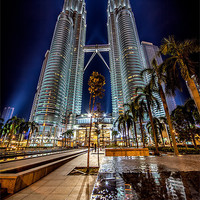 Buy canvas prints of Petronas Towers Kuala Lumpur by Adrian Evans