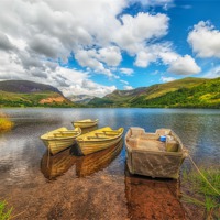 Buy canvas prints of Boats at Nantlle Lake Wales by Adrian Evans