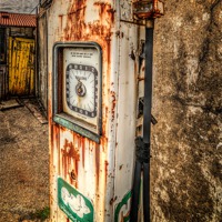 Buy canvas prints of Rusty Gas Pump by Adrian Evans