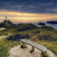 Buy canvas prints of Llanddwyn Lighthouse Anglesey by Adrian Evans