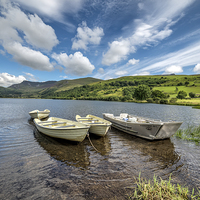Buy canvas prints of Moored Boats Nantlle Uchaf Lake  by Adrian Evans