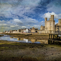 Buy canvas prints of Caernarfon Castle Wales by Adrian Evans