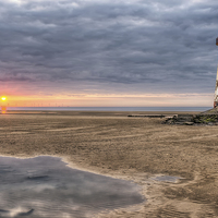 Buy canvas prints of Lighthouse Sunset by Adrian Evans