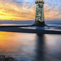 Buy canvas prints of Talacre Lighthouse Sunset by Adrian Evans