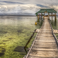 Buy canvas prints of Rickety Pier Mactan Island Philippines by Adrian Evans