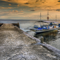 Buy canvas prints of Tour Boat Sunset by Adrian Evans