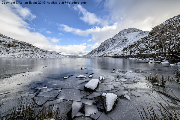 Frozen Ogwen Lake Snowdonia  Picture Board by Adrian Evans