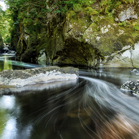Buy canvas prints of Fairy Glen Gorge by Adrian Evans