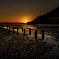 Buy canvas prints of Sunset By The Beach Deganwy by Adrian Evans