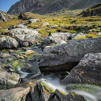 Buy canvas prints of Clouds Over Tryfan by Adrian Evans