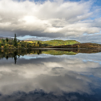 Buy canvas prints of Bodgynydd Lake Reflections by Adrian Evans