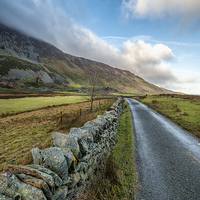 Buy canvas prints of Road to Winter Nant Ffrancon Wales by Adrian Evans