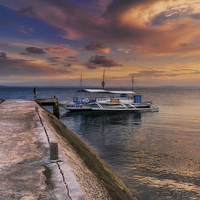 Buy canvas prints of Pandanon Island Sunset Philippines by Adrian Evans