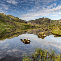 Buy canvas prints of Mountain Reflection Llyn Ogwen Snowdonia  by Adrian Evans
