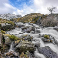 Buy canvas prints of Mountain River Cwm Idwal Snowdonia  by Adrian Evans