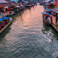 Buy canvas prints of Floating Market Sunset by Adrian Evans